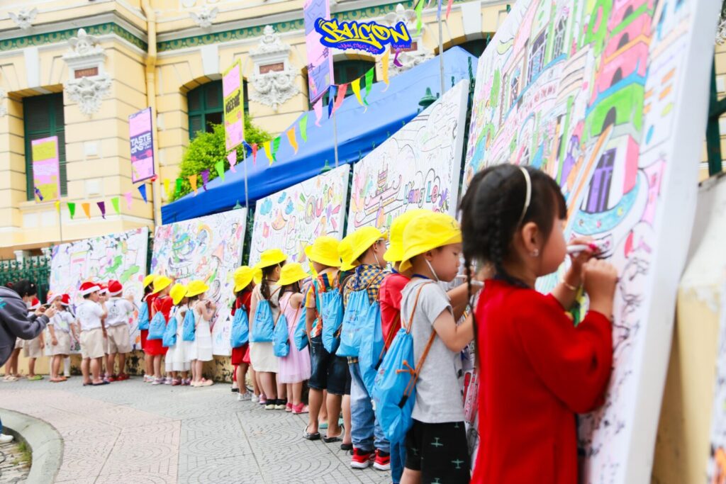 Kids enthusiastically coloring the doodle artworks
