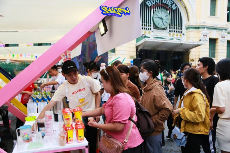 Visitors eagerly explored products at the Hillway milk tea booth