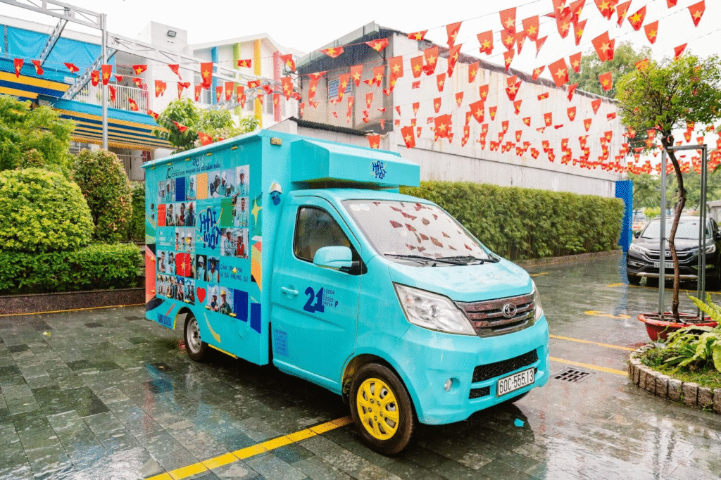 The turquoise Happy Coffee Truck across Vietnam. Photo: Coteccons