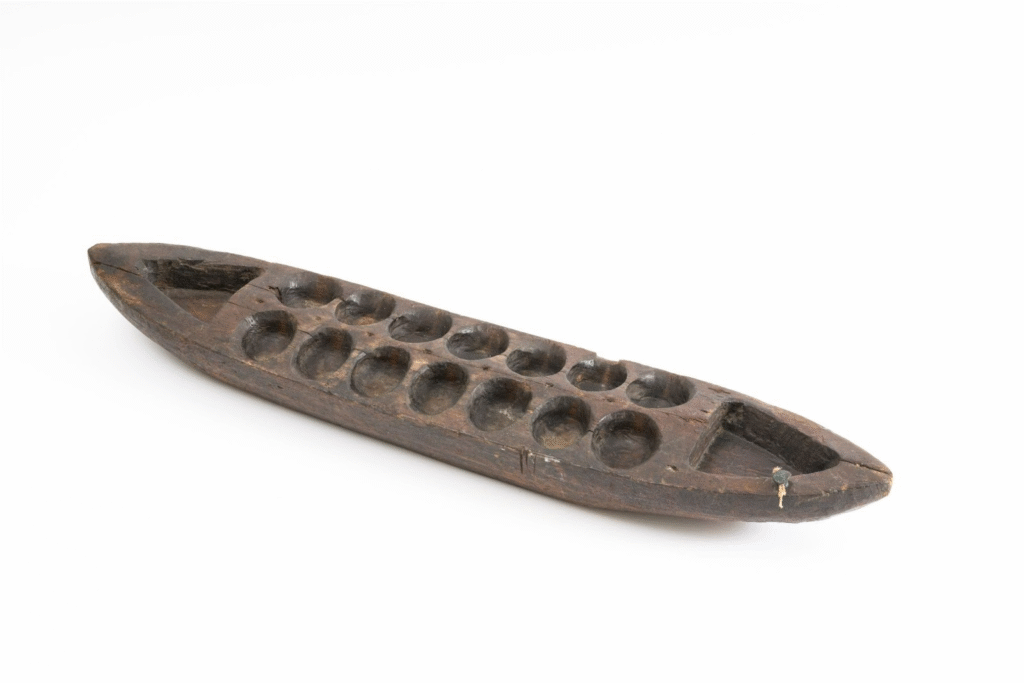 The traditional game of congkak also makes its appearance in the exhibition space